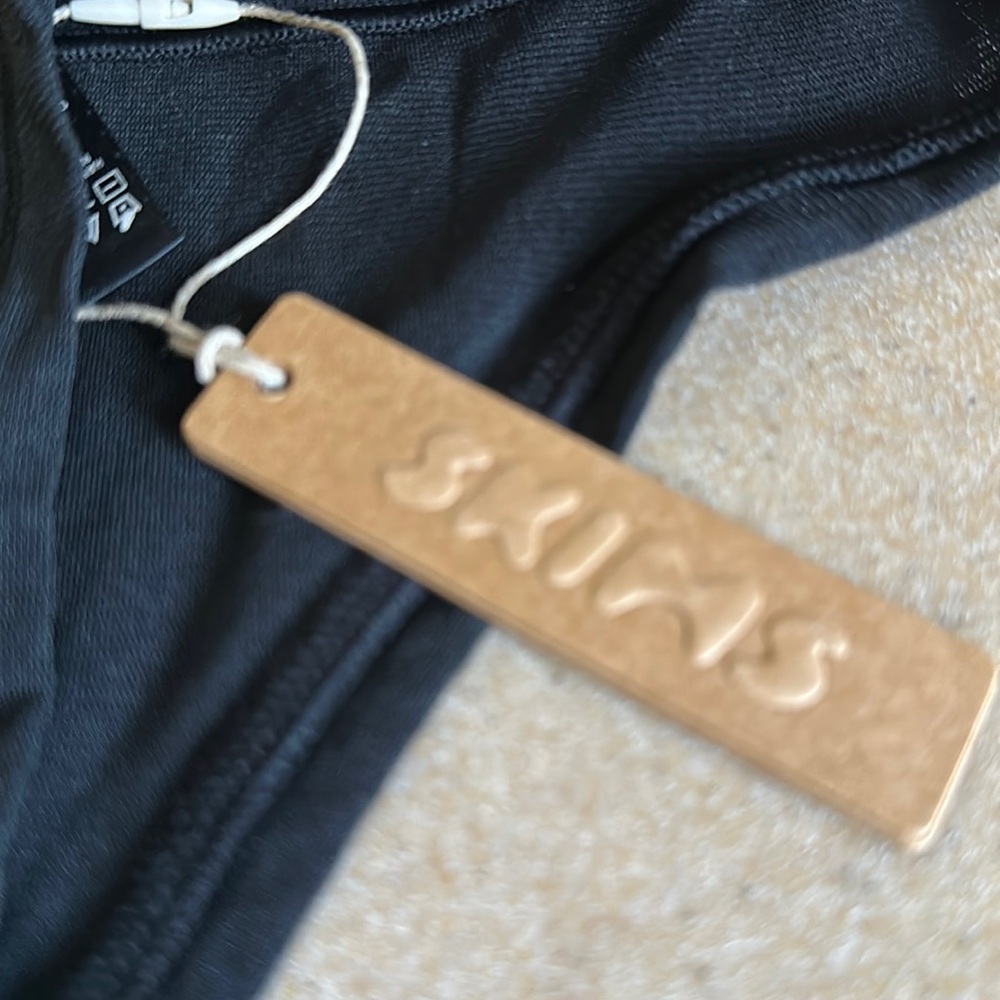 Skims onyx thong size large